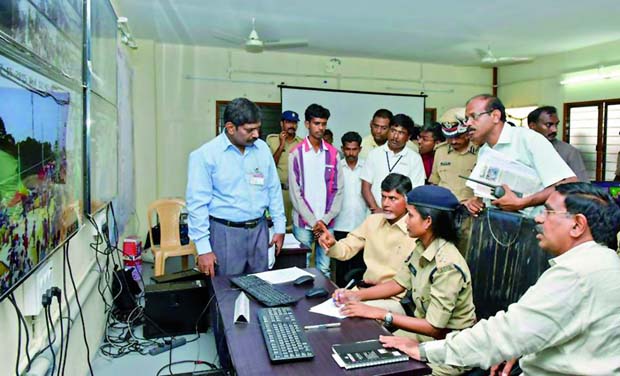 Andhra Pradesh Chief Minister N. Chandrababu Naidu at a control room with officials in Rajahmundry on Wednesday. (Photo: DC) Andhra Pradesh Chief Minister N. Chandrababu Naidu at a control room with officials in Rajahmundry on Wednesday. (Photo: DC)